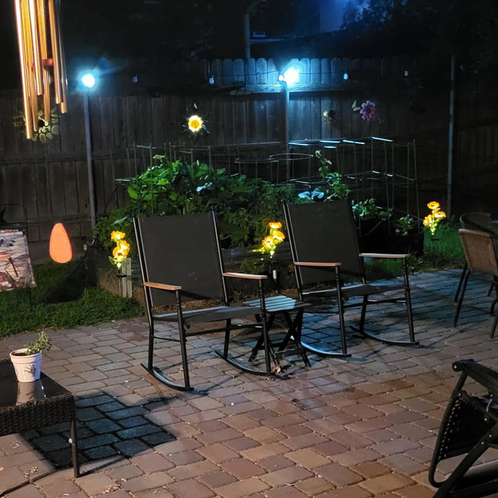 Solar sunflower lights glowing around an outdoor seating area